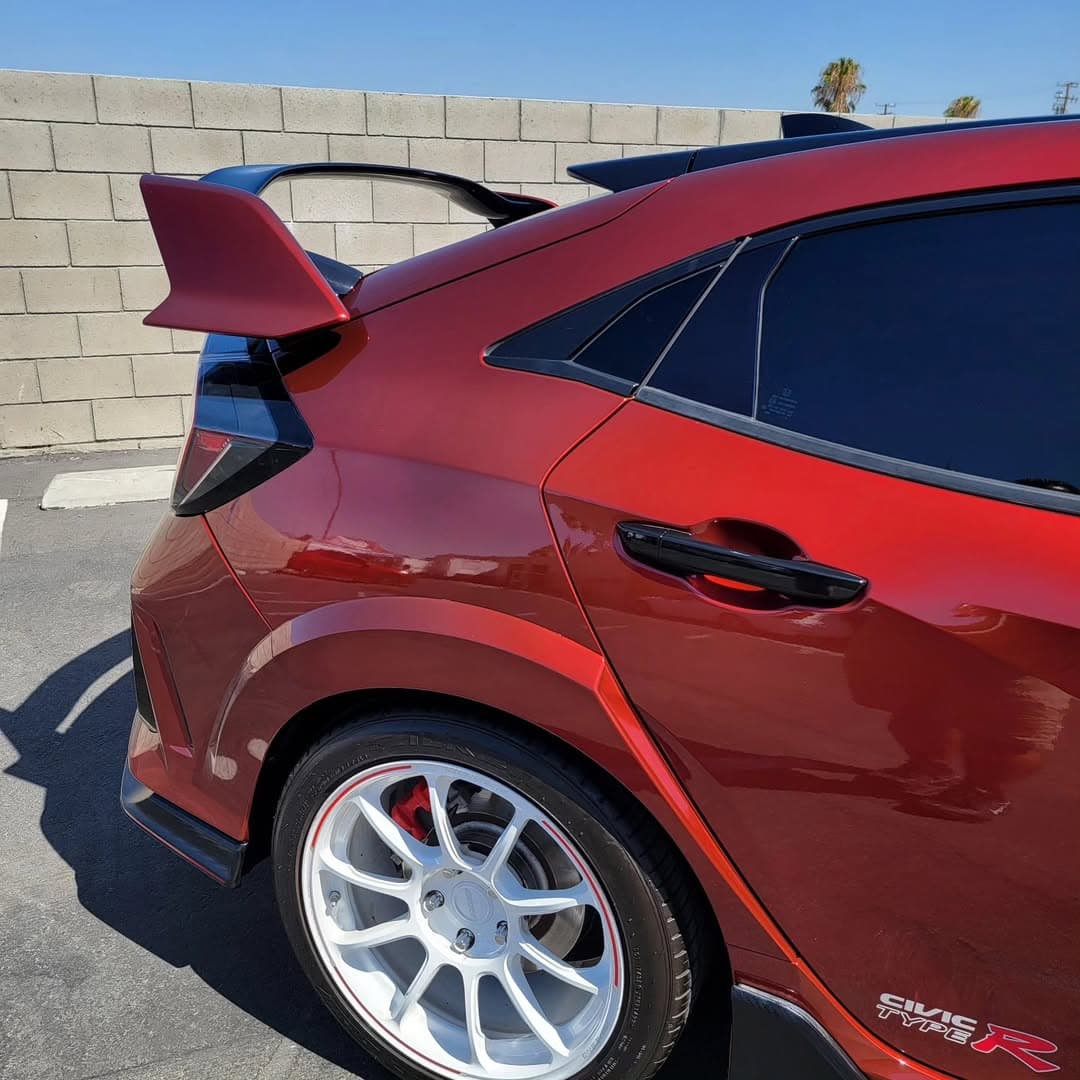 Red Honda Civic Type R rear view with custom spoiler treatment